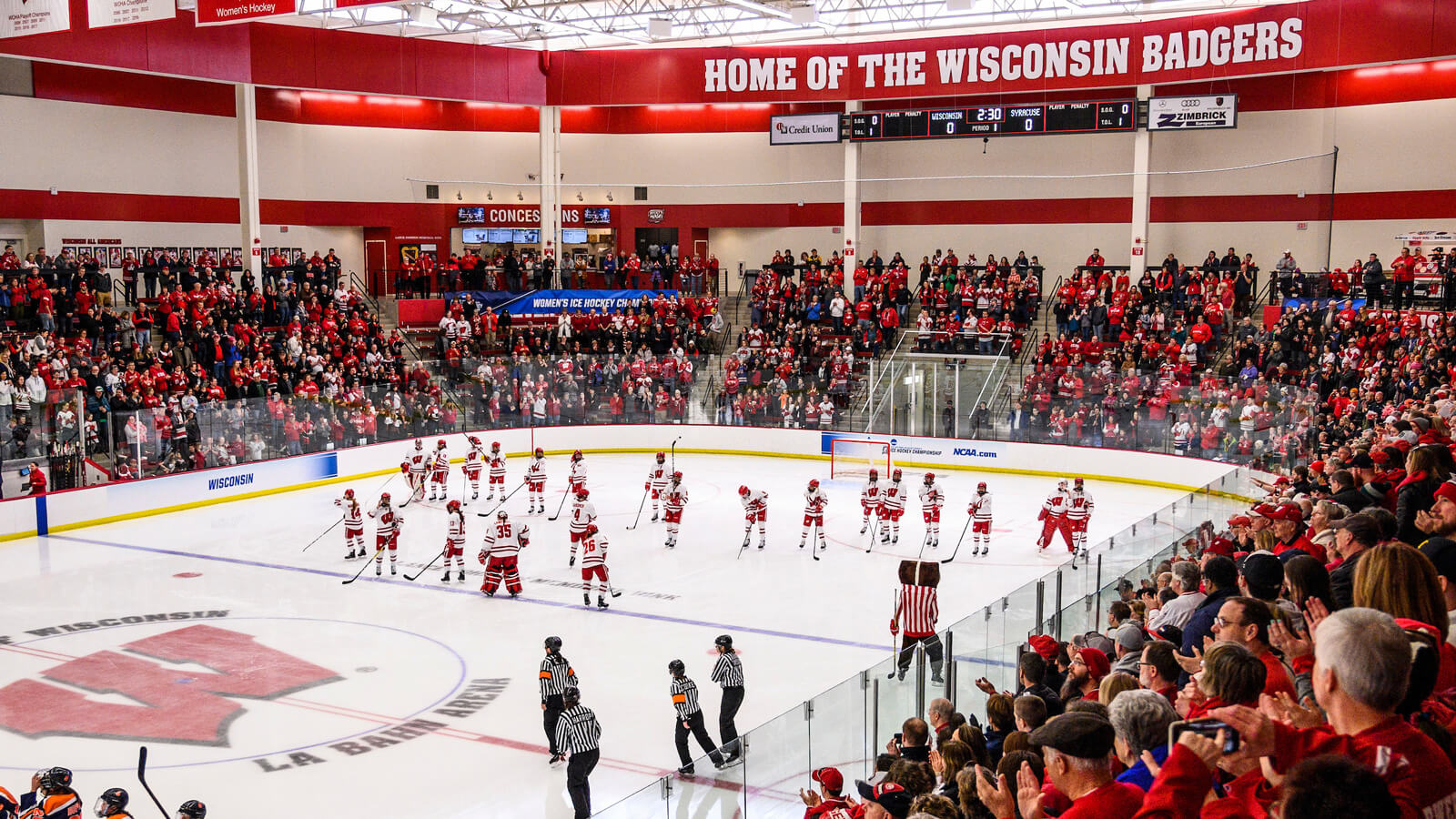 The UW Women's Hockey Team on the ice at the LaBahn Arena